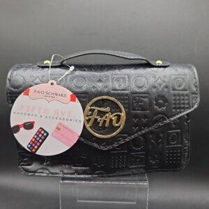 FAO Schwarz Fifth Ave Black Handbag With accessories and hand and arms strap
